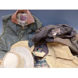 Three waterproof coats comprising Mulberry waistcoat (L), Driza-bone stockman's jacket (XL) and