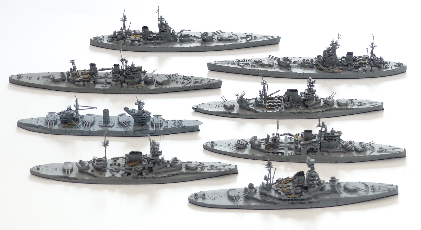 Eight Neptun diecast model waterline ships including Barham, Rodney, Malaya etc, largest 18cm long