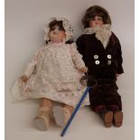 Two bisque headed dolls, one Lillian Middleton with fixed blue eyes, open mouth, long brown hair and