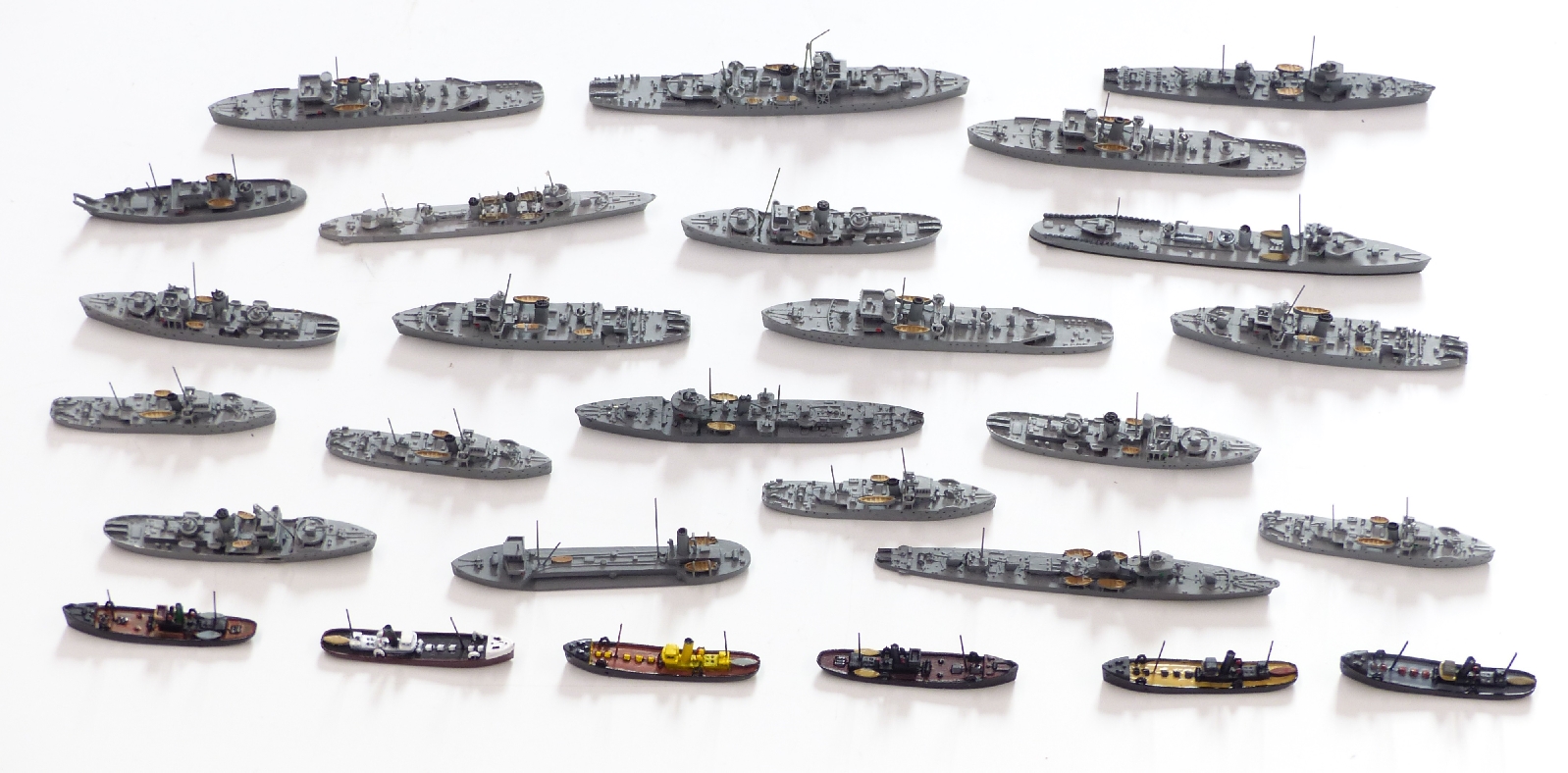 Twenty-seven Neptun and similar diecast model waterline ships including military and merchant,