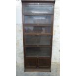 Globe Wernicke style glazed oak six division bookcase, the bottom piece a two door cabinet. W88 x