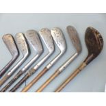 Collection of vintage golf clubs including George McDowell, George Daniel, Tom Fernse, Allamby etc