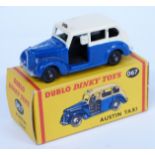 Dublo Dinky Toys diecast model Austin Taxi with blue and cream body 067, in original box.