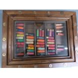 Wooden shotgun cartridge glazed display case with 44 paper cased cartridges including Eley,