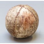 A 19thC hand stitched leather feather filled golf ball