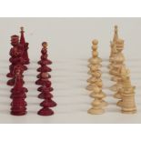 An 18thC English antique ivory chess set with cleft knights, in original bentwood box with faded