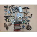 A quantity of motorcycle spares including BSA footbrakes, FS1E yokes etc