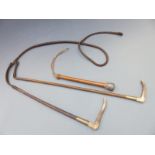 Two horse riding whips/crops with leather and deer horn mounts, one dated 1901 and an Edwardian