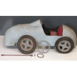 Vintage child's pedal racing car of steel construction with upholstered seat, possibly modelled on a