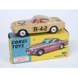 Corgi Toys diecast model Volvo P.1800 with beige body, red interior and USAF military decals, in