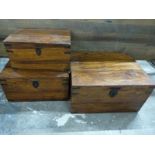 Set of three graduatedmetal bound hardwood boxes. Largest W59 x D45 x H32cm