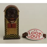 German tin plate mechanical novelty money box and an enamel British Rail 'Lock Out' armband