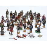 Over 30 Britains and similar diecast model soldiers.