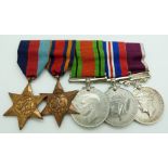 British Army WWII medals comprising 1939/1945 Star, Burma Star, Defence Medal, War Medal and Long