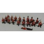 Nineteen Britains lead model infantry soldiers all but one, kneeling and 4cm tall