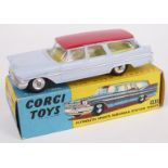 Corgi Toys diecast model Plymounth Sports Suburban Station Wagon with pale blue body, red roof and