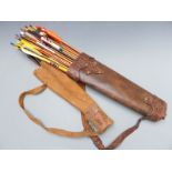 Two leather quivers containing a large quantity of archery arrows including Eclipse, Longshot, Ben