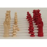 Calvert ivory antique chess set in red and natural with finely carved knights and kings wearing