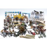 A large collection of model solders, vehicles, cannon and accessories, some in original boxes.