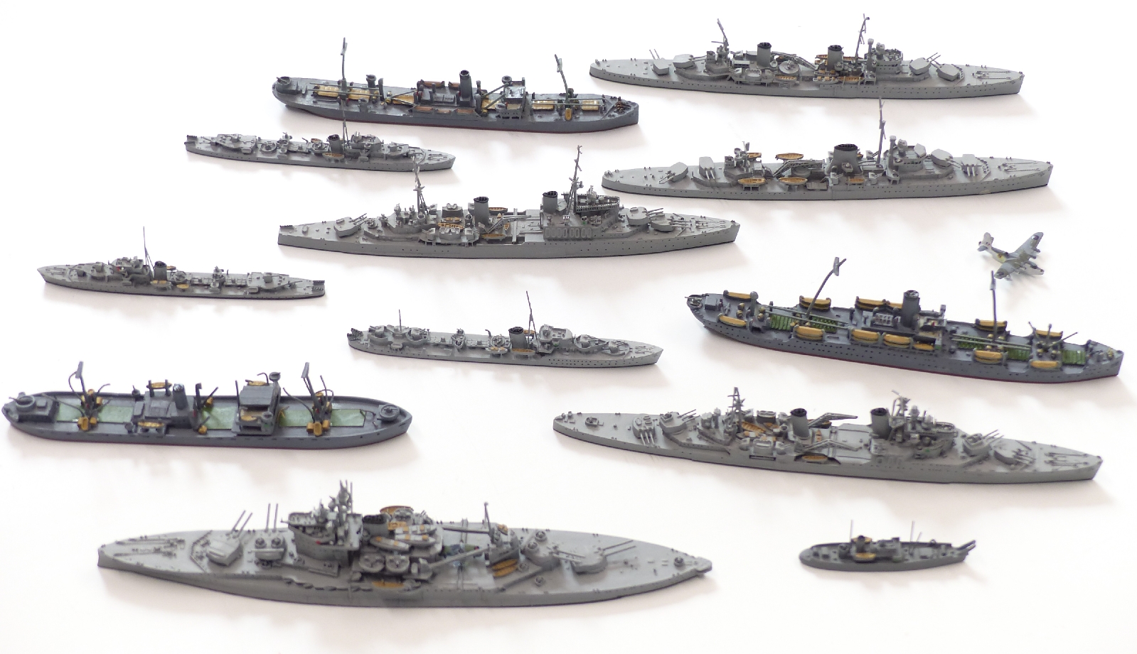 Twelve Neptun diecast model waterline ships including Warspike, Manchester, Uganda etc, largest 15.