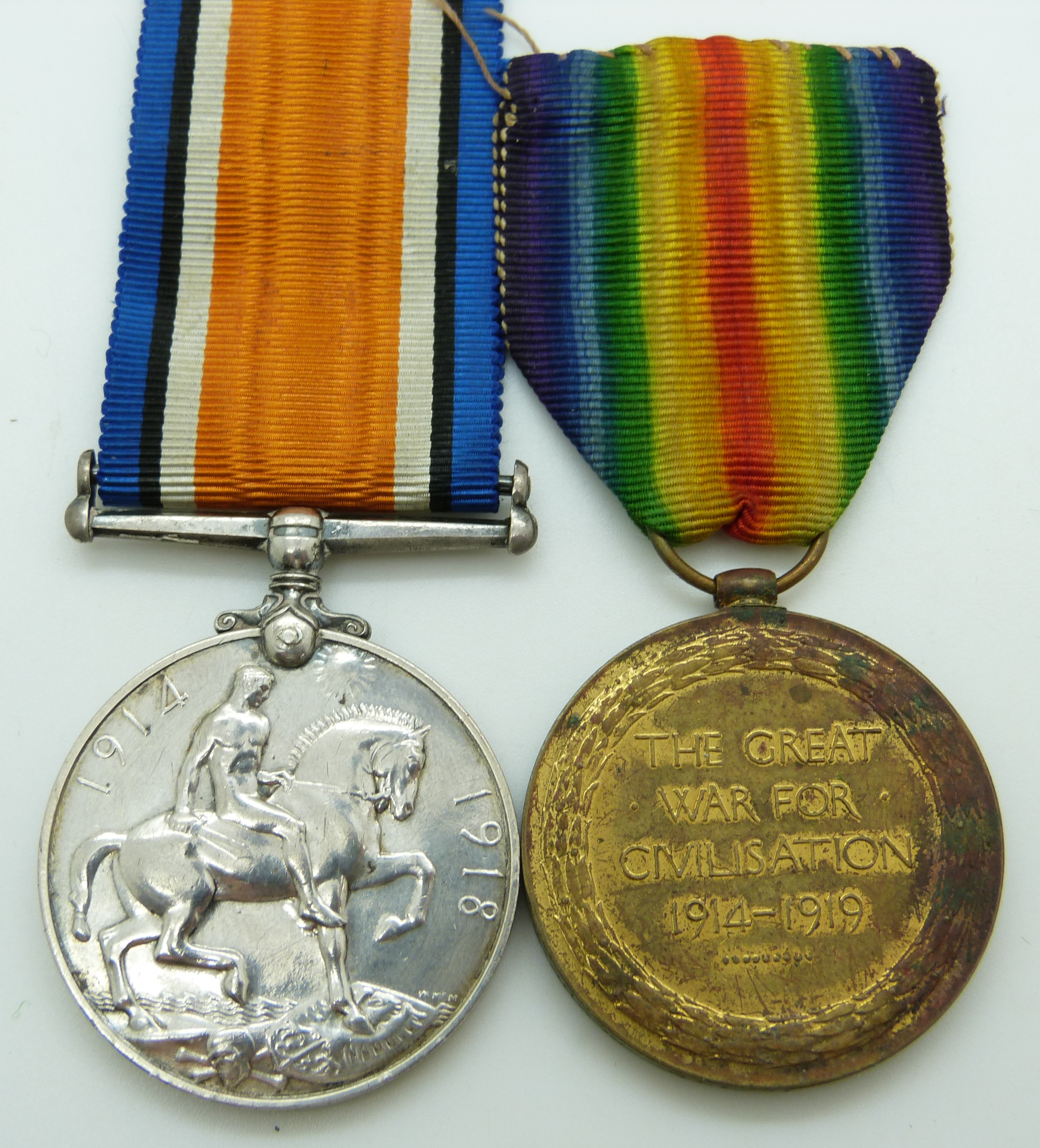British Army WWI medals comprising War Medal and Victory Medal named to 26259 Pte G Martin,