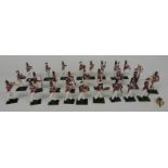 Twenty six Britains diecast model Coldstream Regiment of Footguards Bandsmen 43105, some in original