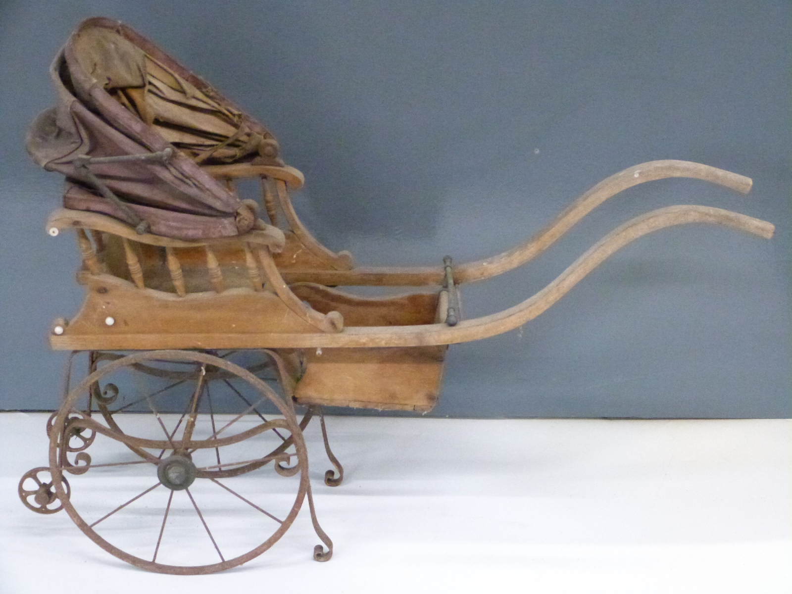 Victorian/Edwardian ash wood dolls' pram with label 'Frederick Aldis, City Toy Shop, 3 Cheapside EC,