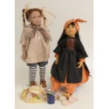 Two composite dolls one D'Anton Jos with open mouth, brown eyes and black hair marked to the back of