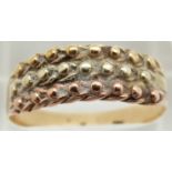 A 9ct gold tri-coloured keeper ring, 2.8g, size U