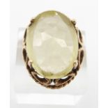 A 9ct gold ring set with a large citrine, 10.2g, size N