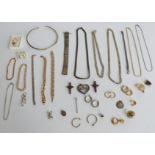 A collection of silver jewellery including three curb link necklaces, bracelets, various pendants