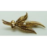 A 9ct gold brooch in the form of fern leaves, set with pearls, 3.8g