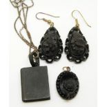 Two Victorian jet earrings, and two jet pendants, including one in the form of a book