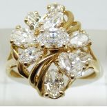 A 9ct gold ring set with cubic zirconia, 4.7g, size Q