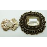 Victorian brooch set with an emerald cut citrine and a yellow metal brooch