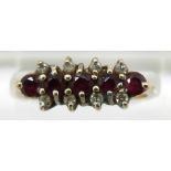 A 9ct gold ring set with rubies and diamonds, 2.1g, size M