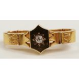 Victorian/ Edwardian 15ct gold scarf clip set with an old cut diamond in a star setting