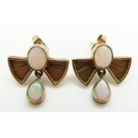 A pair of 9ct gold earrings each set with two oval opals