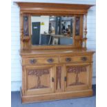 19th or early 20thC Arts and Crafts/Art Nouveau dresser, the top having bevelled mirror flanked by