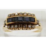 A yellow metal ring set with square cut sapphires and diamonds, 3.4g, size O