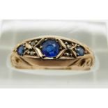 A 9ct gold Edwardian ring set with blue stones, Chester 1912, 1.8g, size M