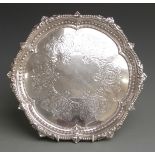 Goldsmiths and Silversmiths Co Ltd, Edward VII silver salver with beaded rim and shell decoration,