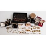 A collection of costume jewellery including earrings, brooches, cufflinks, silver necklace etc