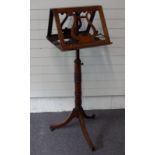19thC mahogany double sided or duet music stand with lyre decoration, with articulated candle