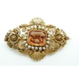 Victorian filigree brooch set with a mixed cushion cut imperial topaz surrounded by pearls, 10.5g,