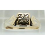 A 9ct gold ring set with a diamond, 2.6g, size N