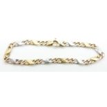 A 9ct gold tri-coloured gold bracelet, 10.6g