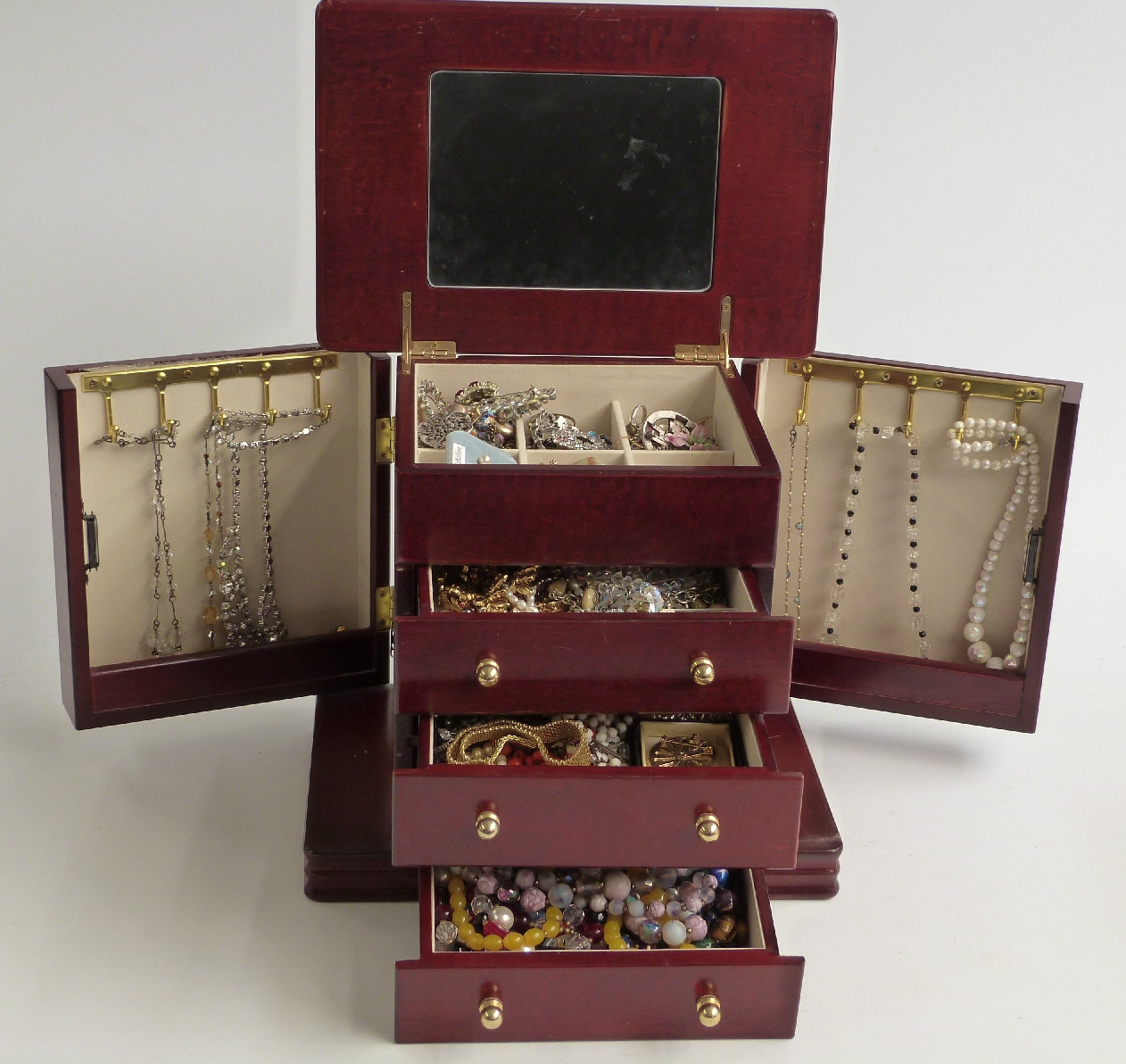 A collection of costume jewellery including silver gilt cameo brooch, silver ring set with