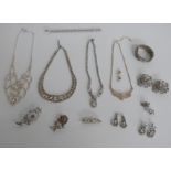 A collection of paste/diamanté jewellery including necklace, brooches and earrings