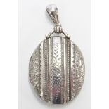 Edwardian silver locket with floral and foliate decoration, Birmingham 1902